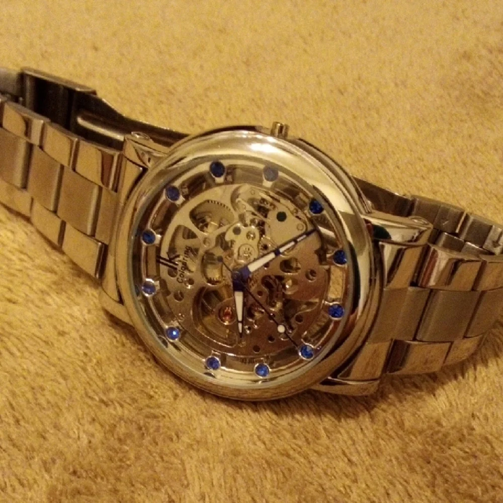 Elegant Silver Watch with Blue Details
